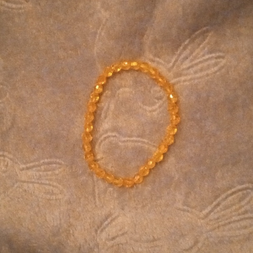 Minimalist handmade shiny and iridescent fun casual bright yellow bracelet